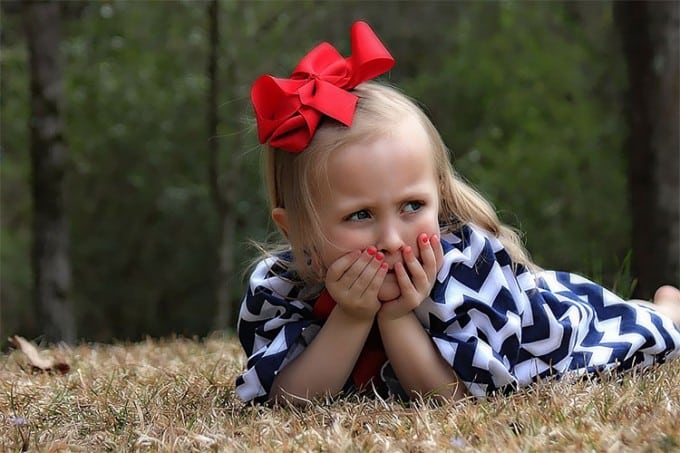 little girl laying down portrait