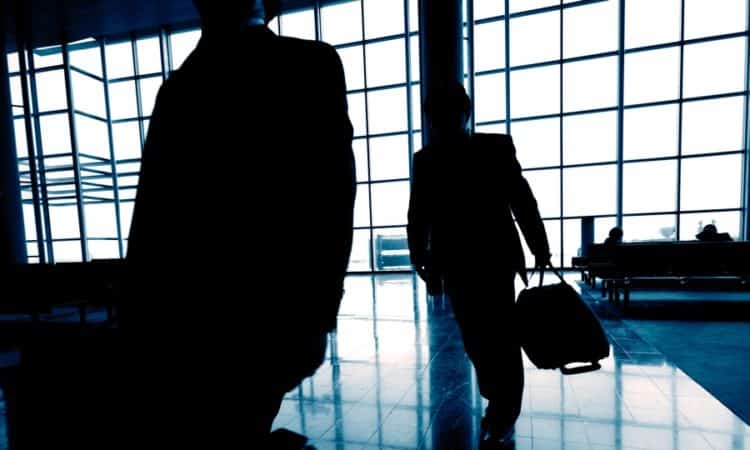 Business Tavelers At Airport