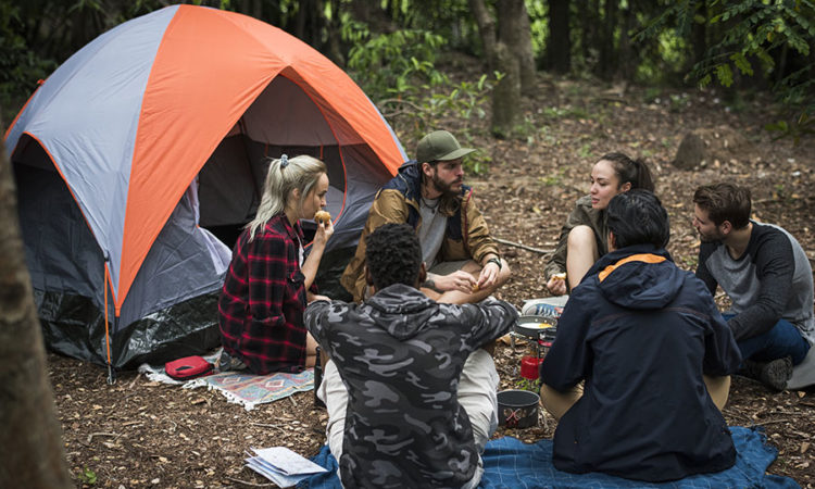 Friends camping in the forest