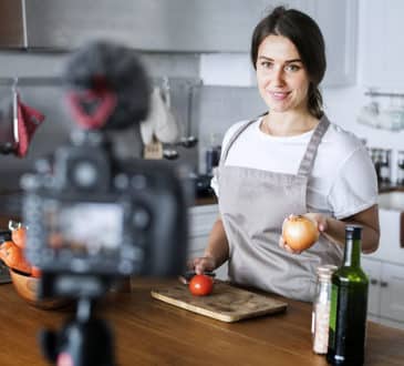 Social Media Influencers vlogger recording cooking