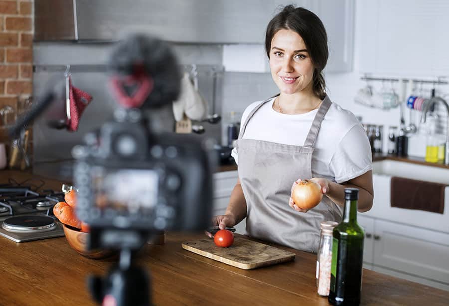 Social Media Influencers vlogger recording cooking