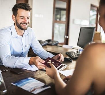 Guests checking in to a hotel