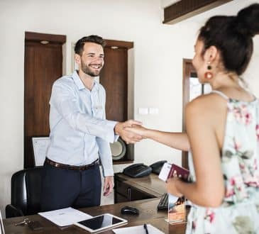 Guests checking in to a hotel