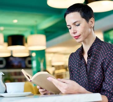 Business Woman Reading A Book