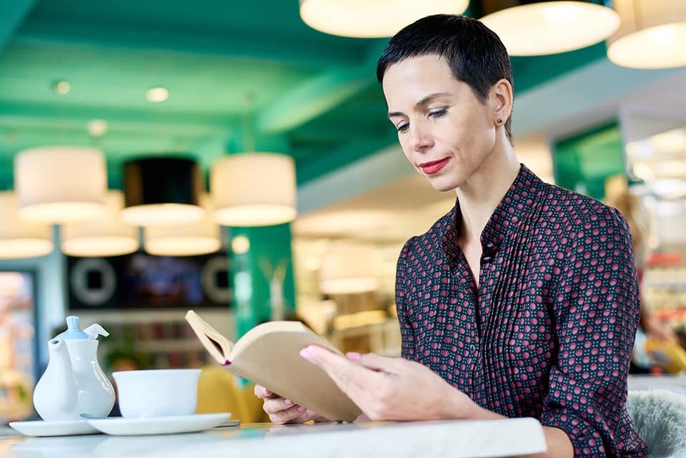 Business Woman Reading A Book