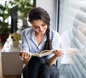 Business Woman Reading A Book