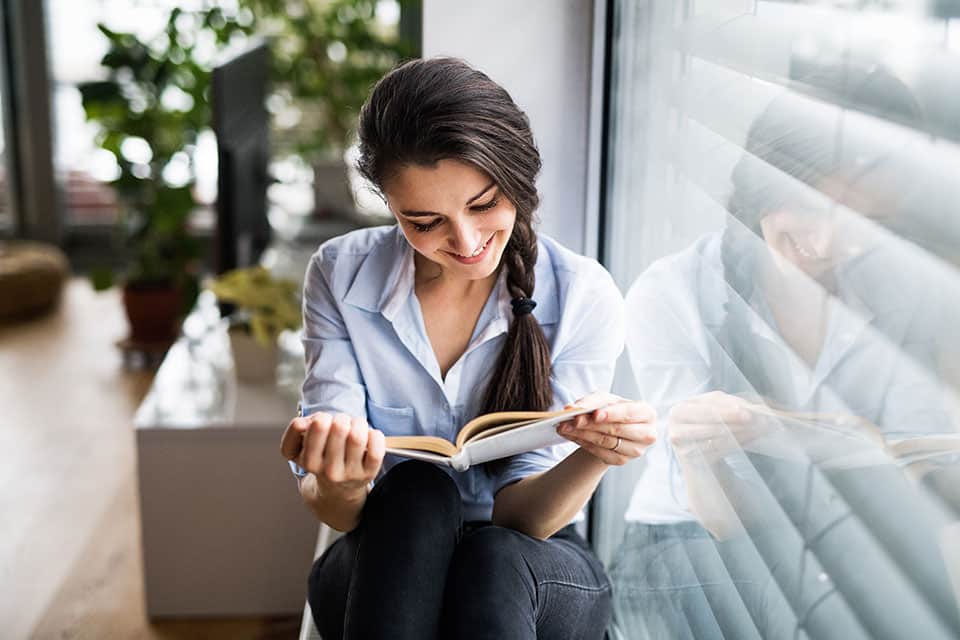Business Woman Reading A Book