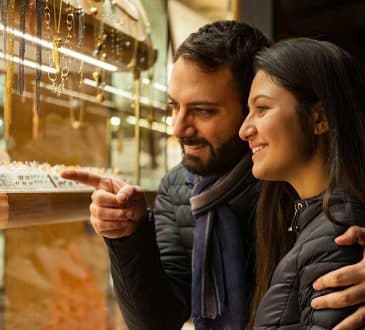 Couple looking at jewelry