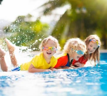 Kids play in swimming pool