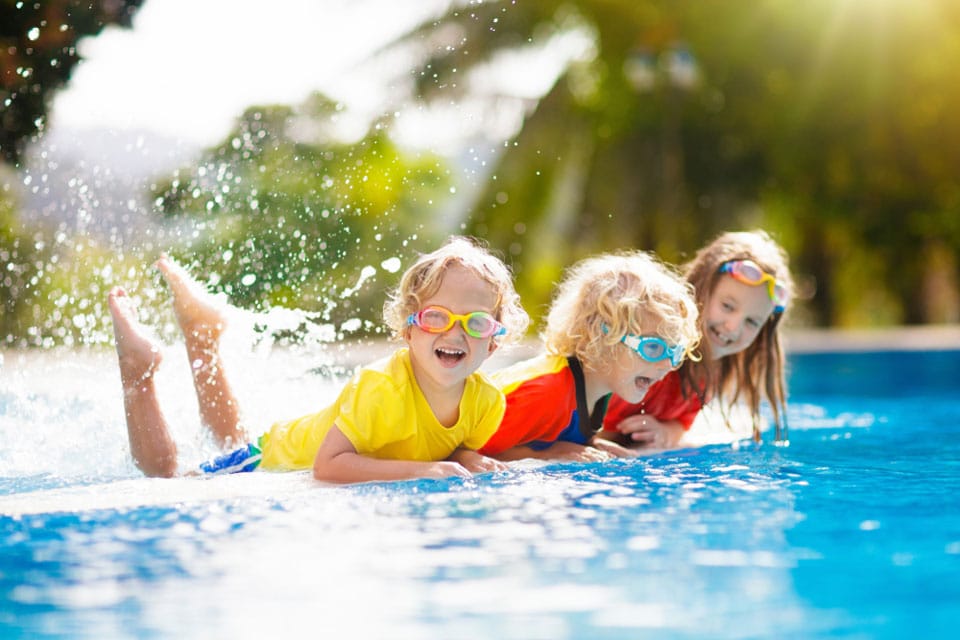 Kids play in swimming pool