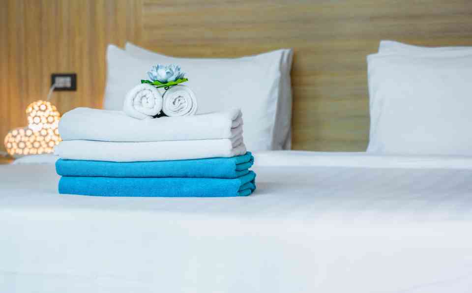 Clean bed with towels