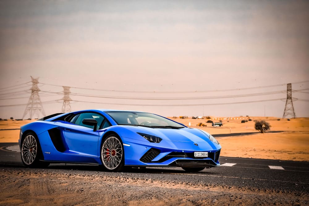 Lamborghini Aventador S supercar on a quiet Abu Dhabi road in the desert, United Arab Emirates