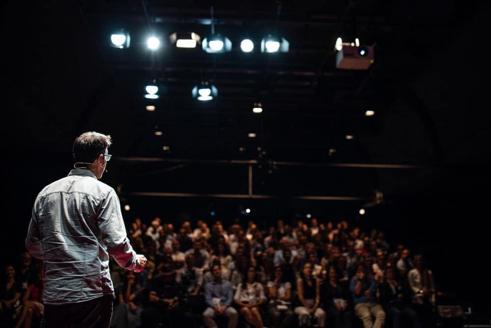 Speaker giving a talk on corporate Business Conference